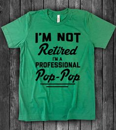 This "I'm Not Retired, I'm A Professional Pop Pop" design is the perfect gift shirt for any Pop Pop! Makes for a great Father's Day Gift. All shirts are unisex (Male & Female) and any tee with rolled sleeves is done just for the picture. Green Funny Tops With Text, Ugly Christmas Sweater Couples, Pop Pop Shirts, Finishing School, Christmas Sweater Party, Pop T, Pop Pop, Ugly Christmas Sweater Party, Great Father