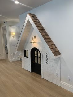 the dog house is built into the wall