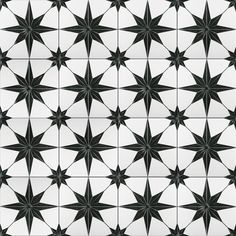 an abstract black and white pattern with stars