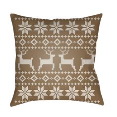 a brown and white pillow with reindeers on it