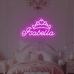 a bedroom with a bed, chandelier and wallpaper that says fabela