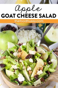 an apple goat cheese salad in a wooden bowl