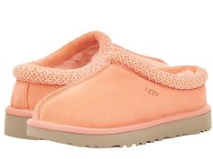 UGG Tasman - Women's Shoes : Grapefruit : The Tasman always fits tight at first especially if someone has a high instep or high volume foot. It does stretch out over time. If you are in between sizes, please size up or down based on the volume of your foot and height of your instep. Take the suede UGG Tasman slip-on from weekday lounging to a Saturday excursion! Features a Tasman trim and a raw seam down the center with an embossed UGG logo at lateral side. Luxurious sheepskin lining for breatha Bedazzled Shoes Diy, Cute Uggs, Pretty Sneakers, Pink Uggs, Ugg Tasman Slippers, Preppy Shoes, Pretty Shoes Sneakers, Ugg Tasman, Shoes Outfit Fashion