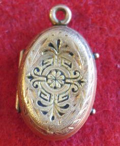 "An Awesome 1890's Victorian 14 Karat Yellow Gold Locket With Photos Necklace Pendant. Visit our shop for awesome retro photos, vintage jewelry, sports memorabilia and home decor. Size: 1/2\" across x 3/4\" high Material: 14 Karat Yellow Gold Condition: Good. Front Is Bowed In. Photos Show Wear. Year: 1890's Signed: Unsigned. Inventory #: 2280" Vintage Filigree Jewelry For Vintage Events, Engraved Gold Jewelry For Vintage Events, Gold Engraved Jewelry For Vintage Events, Vintage Hallmarked Jewelry For Vintage Events, Vintage Gold Etched Jewelry, Antique Oval Jewelry For Vintage Events, Vintage Gold Jewelry With Etched Details, Victorian Oval Jewelry For Vintage Events, Vintage Filigree Pendant Jewelry