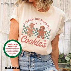 Quote: teach the smartest cookie Layout: Arc sandwich Color theme: retro Meaning of design: sự tự hào của người giáo viên + mang tới christmas vibes Design style: retro Focal point: ---- Artwork: Cute illustate Font: vintage bold font - text style: old printing machine Trend: --- seasonal: christmas MK: Tee Note: Mẫu này không đặc sắc. Tag: Gingerbread, Chritmas shirt, Checkered broad, retro shirt, Teacher shirt. Student shirt, school Retro Christmas Shirt, Cookie Shirt, Tee Party, Smart Cookie, Fun Sweatshirts, Teacher Tees, Teacher Christmas, Adulting Shirts, Team Shirts