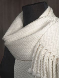 "15% OFF when you buy 2 or more scarves. Enter coupon code: 15FOR2 at checkout. HEAVY DUTY WINTERWEAR! A natural warm white in an 8/4 herringbone weave. This is the same design as my popular standard weight white scarf only executed in the heavyweight merino/tencel yarns for extra warmth. Merino / tencel blend. yarn colors: natural An extra heavyweight winter scarf woven in my signature style. It is woven with a 50% Merino wool / 50% Tencel fiber blend. Tencel is a cellulose fiber with silk-like Mens Winter Scarf, Beige Scarf, Merino Wool Scarf, Handwoven Scarf, White Scarf, White Scarves, Handwoven Fabric, Blue Scarf, Scarf Men