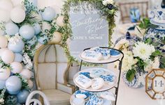 blue and white desserts are displayed on plates