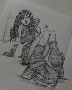 a drawing of a woman sitting on the ground