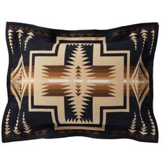 a black and brown pillow with an intricate design on the front, side and back