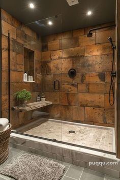 a bathroom with a walk in shower next to a sink