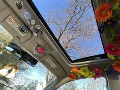 the sunroof is decorated with flowers and stickers