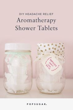 two jars with labels on them that say diy headache relief aroma therapy shower tablets