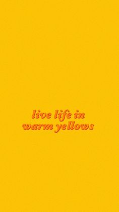 the words live life in warm yellows are displayed on a bright yellow wallpaper