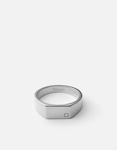 Our Geo Signet Ring is an exploration of the endless shapes around us. We reworked the classic circular signet style through the use of a three dimensional shape, the rectangular prism. This sleek, low-key design was made with the modern minimalist in mind. Made in sterling silver, enhanced with a diamond. Our diamonds are conflict free ethically sourced. [tab]Specifications[/tab]Base Metal: Sterling SilverPlating: RhodiumMaterial: 1 DiamondDimensions: L: 9.9mm x W: 7mmGauge: 1.5mmTotal Carat We Mens Ring Designs, Mens Designer Jewelry, Rectangular Prism, Silver Ring Designs, Signet Ring Men, Sterling Silver Mens Rings, Silver Signet Ring, Silver Wedding Rings, Wedding Ring Designs