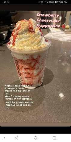 an ice cream sundae with strawberry cheesecake topping