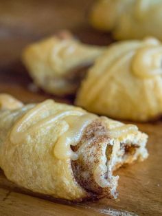 some pastries are sitting on a cutting board