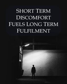 a man standing in front of a building with the words short term discom fuel long term fulfillment