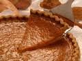 a close up view of a pie crust with one slice cut out and the other half eaten