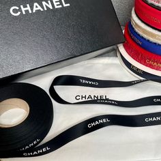 Classic Chanel Logo Ribbon With White Lettering On A Black Background, Never Used And Perfect For Crafting, Gifts And Hair Ribbon! Measures 5/8��” X 1 Yard. Message For Longer Lengths And Join My Live Show To See In Person! Please Note: Due To Poshmark’s Recent Change (10/03) In Fee Structure, The Price Of This Item Has Been Reduced In Order To Alleviate The Newly Charged Fee For The Buyer, I Believe You Should Not Have To Sacrifice An Opportunity To Treat Yourself Or Someone You Love! I Am Always Chanel Ribbon, Chanel Camellia Flower, Crafting Gifts, Chanel Long Wallet, Chanel Party, Chanel Black And White, Black And White Ribbon, Classic Chanel, Black Packaging