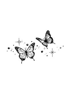 two butterflies flying in the air with stars around them and one is black and white