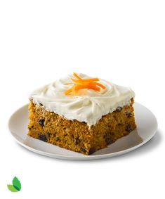 a piece of carrot cake on a white plate