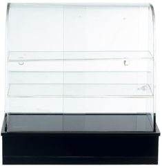 an empty glass display case on a black stand