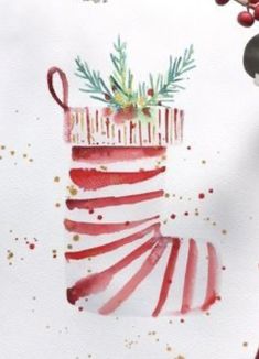 a watercolor painting of a christmas stocking