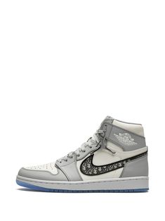 Wolf grey/sail white leather x Dior Air Jordan 1 High sneakers from JORDAN featuring round toe, flat rubber sole, front lace-up fastening, branded insole, monogram pattern and ankle-length. These styles are supplied by a premium sneaker marketplace. Stocking only the most sought-after footwear, they source and curate some of the most hard to find sneakers from around the world. | Jordan x Dior High sneakers Air Jordan X Dior, Shoes Retro, Jordan 1s, High Sneakers, Air Jordan 1 Retro High, Air Jordan 1 High, School Fits, Jordan 1 High, Air Jordan 1 Retro