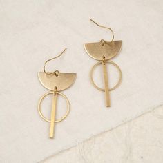 Our earrings with circle and bar pendants are inspired by ancient cultures and modern shapes. All pieces of jewelry are made of sustainable brass, which acquires a unique patina over time. The jewelry is as light as a feather and fits your everyday outfit or a special occasion. Dimensions: 52 mm x 20 mm x 1 mm Info: Brass is an alloy of copper and zinc. It is a very compatible jewelry material for most people. Brass develops a typical patina over time. Contact with water, perfume and other subst Bar Pendants, Water Perfume, Modern Shapes, Birthday Gifts For Best Friend, Half Circle, Bar Pendant, Gifts For Sister, Ancient Cultures, Earrings Long