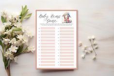 a baby shower game with flowers on the side