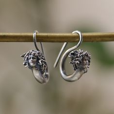 Medusa Earring 925 Silver, Witch Medusa Jewelry, Snake Jewelry,, Handmade Earring, Mythological Jewelry, Greek God, Earring Antique Silver This is made with 925 Silver material. Let's not forget that it is handmade. There may be minor differences. It can be made with other materials. You can send a message. If you have any questions, please feel free to contact me, we are happy to help. Your jewelry will be packed in a luxury jewelry box ready to be given as a special gift. Visit my shop to view Unique Sterling Silver Hoop Earrings For Pierced Ears, Symbolic Silver Sterling Silver Plug Earrings, Silver Symbolic Earrings For Jewelry Making, Symbolic Silver Earrings With Ear Wire, Symbolic Sterling Silver Drop Earrings, Symbolic Silver Hoop Earrings With Ear Wire, Handmade Sterling Silver Round Plug Earrings, Unique Sterling Silver Pierced Earrings, Silver Handmade Symbolic Earrings