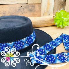 You will absolutely love this beaded hatband! Each design is so unique featuring flowers, shapes or animals. Total length varies from 22-23 inches. Your hat will never look the same by adding this accessory! Adjustable Hat Band With Bead Caps For Festival, Adjustable Bead Cap Hat Bands For Festival, Festival Adjustable Hats With Bead Caps, Adjustable Festival Hats With Bead Caps, Adjustable Bead Caps Hats For Festivals, Adjustable Bead Caps Festival Hats, Handmade Blue Hat Bands For Rodeo, Handmade Southwestern Blue Hat Band, Traditional Adjustable Hats With Bead Caps