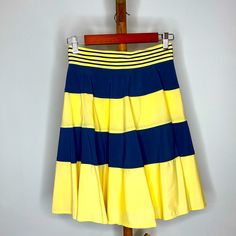 Adorable Navy And Yellow Z Spoke Striped Skirt. Never Worn With Tags. Zipper Detail On The Back And Super Cute Belt Stripe Detail Yellow Retro Skirt With Relaxed Fit, Yellow Fitted Tiered Skirt, Fitted Yellow Tiered Skirt, Summer Color Block Fitted Skirt, Color Block Skirt For Summer, Fitted Color Block Skirt For Summer, Fitted Yellow Tiered Mini Skirt, Yellow Stretch Lined Mini Skirt, Stretch Yellow Mini Skirt With Lining