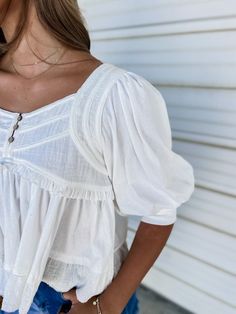 This off white top is calling your name! It has the cutest ruffle and raw edge detailing, which gives the perfect mix of distressed and chic! It even has an adorable button detail up the front! Pair this with some bellbottom jeans and boots for the perfect look! Wear it out with the girls or on a date night! Model is 5'7" wearing a small, making this true to size. 100% Cotton GENERAL SIZE CHART: 00-EXTRA SMALL, 0-2 SMALL, 4-6 MEDIUM, 8-10 LARGE, 12-14 EXTRA LARGE Each item runs differently there Now Or Never, Summer Street, Street Style Summer, Senior Photos, Button Detail, Raw Edge, White Top, Name It, Christmas List