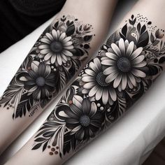 black and white flower tattoos on both arms, one arm with flowers in the middle