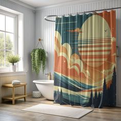 a bathroom with a shower curtain that has an image of the sun in the sky