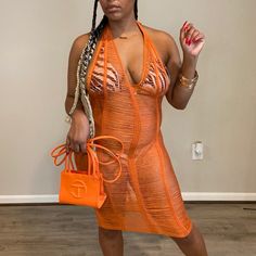 Bae-Cation Anyone?! This Knit See Through Cover Up Is Perfect For The Ultimate Getaway Vacation! Can Be Worn On Excursions, To Yacht Parties, And Beach Clubs. Comes In Black And Orange, Two Colors That Will Make Your Skin Glow And Make You Stand Out From The Rest. The Way It Drapes Against Your Body, You Need To Have This Item In Your Coverup Collection Ready To Slay! Stretch Cover Up V Neck Sleeveless Crochet See-Through Self Tie 100% Acrylic Hand Wash Cold Do Not Bleach Trendy Orange Beach Dress, Bae Cation, Yacht Parties, Beach Clubs, Yacht Party, Perfect Storm, Skin Glow, Black And Orange, Cover Up Dress