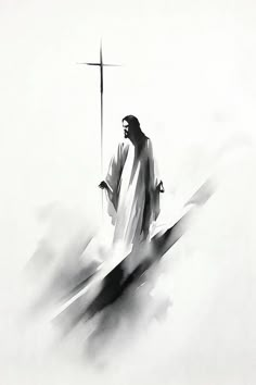 a black and white photo of a man with a cross on top of a hill