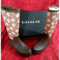 Elevate Your Rainy Day Style With These Coach Rain Boots. The Knee-High Boots Come In A Beautiful Tan And Dark Brown Color Combination With A Charming Pink Floral Print That Adds A Touch Of Feminine Grace To Your Outfit. The Round Toe Shape And Low Block Heel Style Provide Comfort And Ease Of Movement, Making Them Perfect For All-Day Wear. These Boots Are Made With Waterproof And Water-Resistant Rubber Material, Making Them An Ideal Choice For Rainy Days. The Outsole Is Also Made Of Rubber, Ensu Waterproof Brown Rain Boots For Outdoor, Dark Brown With Pink, Knee-high Waterproof Rain Boots For Winter, Casual Knee-high Rain Boots For Outdoor, Coach Rain Boots, Winter Waterproof Knee-high Rain Boots, Rainy Day Style, Rainy Day Fashion, Grace To You