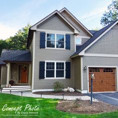 a large house with two garages in the front and one on the other side