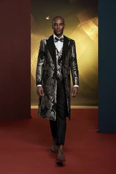 This luxury grey metallic patterned tuxedo for men or women is perfect for exclusive formal events. The three piece extended jacket is a detailed addition to elevate your collection. FREE SHIPPING ON ORDERS OVER $199 COLOR Black/Silver COMPOSITION N/A YARN COUNT N/A WEIGHT 290g FABRIC STYLE Jacquard OCCASION Wedding/Gala Patterned Tuxedo, Suit For Men, Tuxedo For Men, Cuffed Pants, Suit Style, Double Breasted Suit, Straight Pants, Three Piece, Formal Event