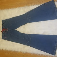 Embrujo Bell Bottom Blue Jeans Has Red Leather Tie Up The Front Has Front Open Pockets Belt Loops Wide Leg Bottoms Made Of 98% Cotton 2% Spandex Size 9. Brand New Missing Tag. Casual Stretch Jeans For Festival, Fitted Casual Jeans For Festivals, Jackie Burkhart, 70s Jeans, Clothes Stickers, Clothing Crafts, Fasion Outfits, Leather Tie, Thrift Finds