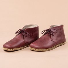 "Our Atlantis Handmade barefoot boots combine high-quality leather and traditional shoemaking skills. It is only through our know-how and belief in barefoot boots, a wealth of experience, and the best materials that we are able to create this unique and top-quality shoe. - Made in Turkey - 100% Natural - 100% Handmade - Hand-Stitched - Ankle Boots with Laces - Natural Leather Upper - Natural Leather Lining - Water Buffalo Leather Sole What are Barefoot Shoes? It is time to feel...EVERYTHING Bare Winter Leather Ankle-high Chukka Boots, Ankle-high Leather Chukka Boots For Outdoor, Classic Ankle-high Chukka Boots With Leather Footbed, Vintage Lace-up Chukka Boots With Leather Footbed, Barefoot Sandals Women, Red Leather Mid-calf Boots With Round Toe, Barefoot Boots, Shearling Slippers, Shoes Stand