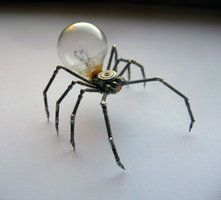 a spider with a lightbulb on its head and legs, standing in front of a white background