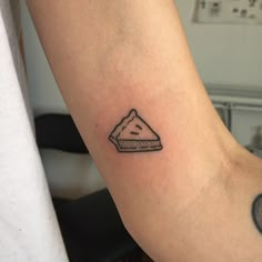 a small piece of pizza on the left arm is shown in black and grey ink