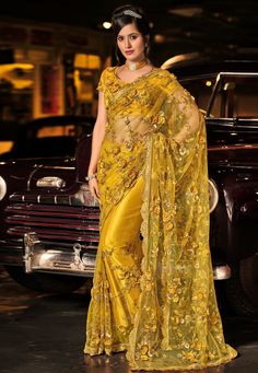 Mustard silk festival wear saree 6010  Desc:  Color : Mustard Fabric : Silk Wash Care : Dry clean Sleeve Style : Short Sleeve Long Sleeves : Done only in Custom Stitch Sleeves Lining : Done only in Custom Stitch Bust Size : 32 to 42 Inches Occasion : Festival   Kitty Party   Sangeet   Party Wear   Engagement   Reception   Ceremonial. With Express Free Shipping and Custom Stitching, Buy Indian Wedding Party Wear Saree Mustard silk festival wear saree 6010 online in USA, UK and Canada from KollyBo Latest Sari Designer Sarees, Heavy Work Saree, Latest Sarees Online, Blue Silk Saree, Heavy Work, Yellow Saree, Embroidered Saree, Indian Sarees Online, Designer Sarees Online