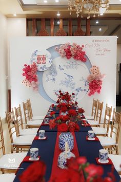 the table is set with red, white and blue flowers