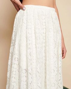 Indulge in the romantic elegance of the Vanilla Lace Midi Skirt, a graceful companion for your leisurely strolls. Crafted from delicate floral lace fabric, it exudes timeless charm with its high-waisted silhouette and refined details. Slip into this enchanting piece, fastened with a concealed zip, and let its ethereal beauty accompany you on your every adventure. The details- High waisted midi skirt in a floral lace fabric. Fully lined and finished with a narrow waistband and a concealed zip fas Vanilla Lace, High Waisted Midi Skirt, Floral Lace Fabric, Lace Midi Skirt, Striped Midi Skirt, Skirts Midi High Waisted, The Ivy, Lace Midi, Ethereal Beauty