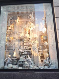 a window display with many different items in it