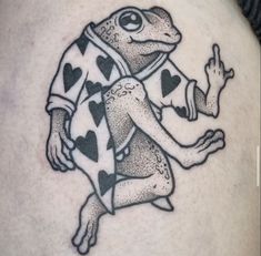 a frog with playing cards on it's back